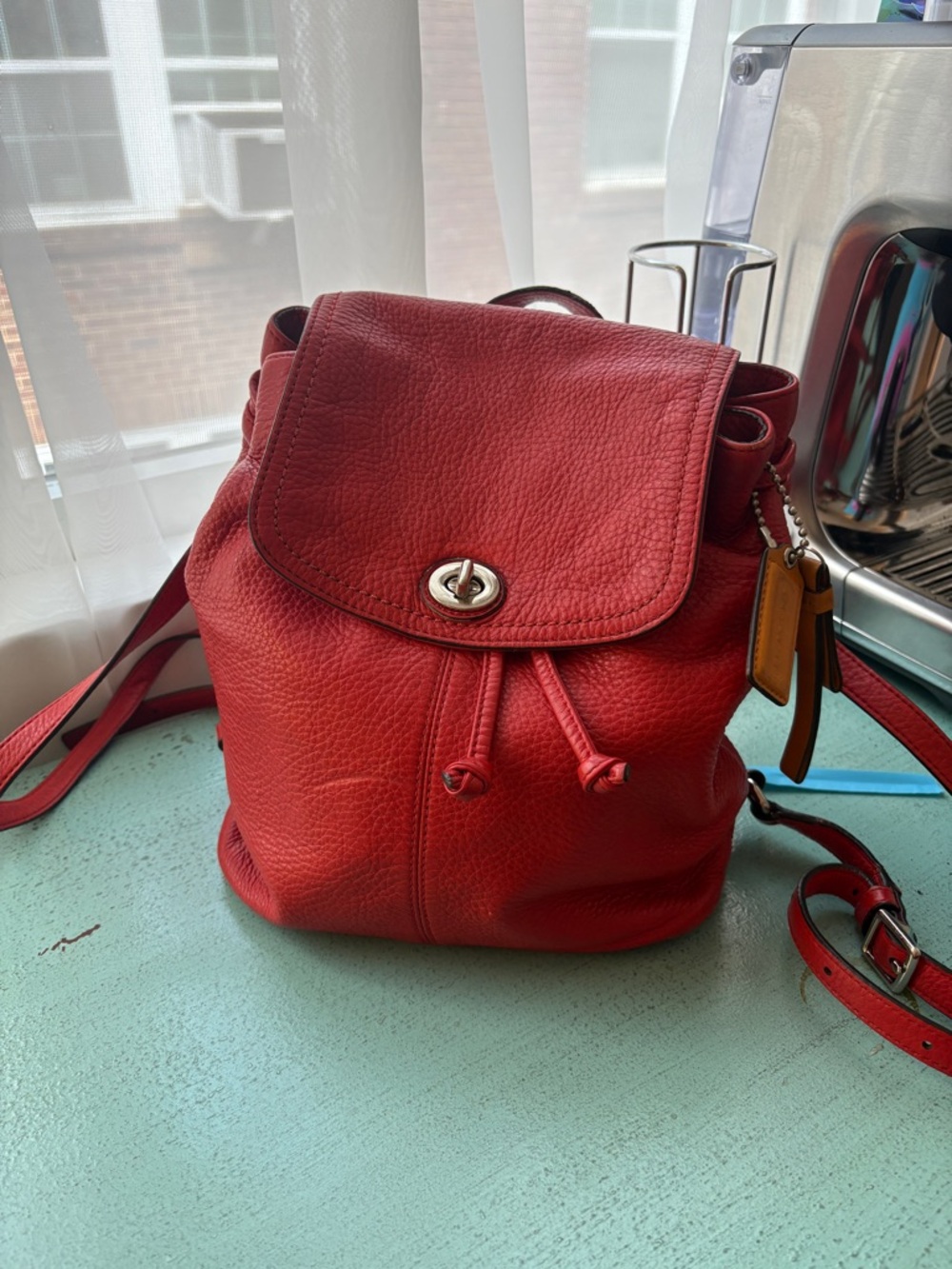 Coach Red Pebbled Leather Drawstring Backpack with Turn-Lock Flap